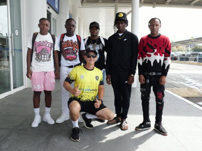 Footbllers-off-to-Steven-Gerrard-Academy2-with-Jonathnan-Thoroughgood-GNFC-Executive-Member.jpg