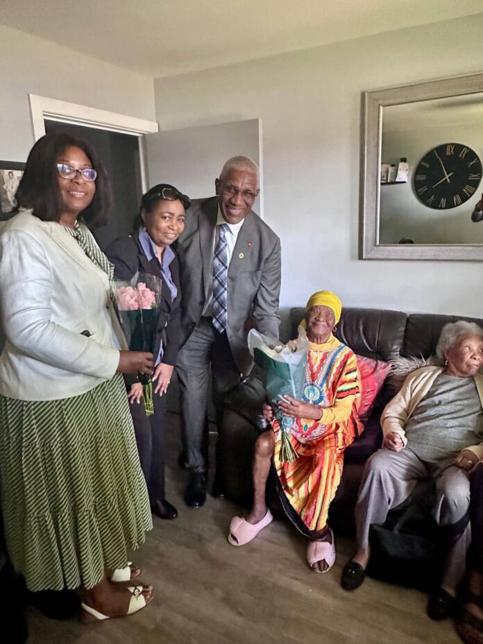 Photo-of-High-Commissioner-Their-Excellencies-Sir-Rodney-and-Lady-Williams-and-Centenarian-Mary-Prince-July-2025-scaled.jpg