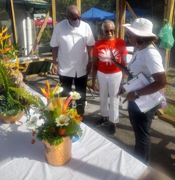 1-Governor-General-in-the-Floral-Competition-Room-with-President-Barbara-Japal-and-Member-Jackie-Ferracho-e1764681167929.jpg