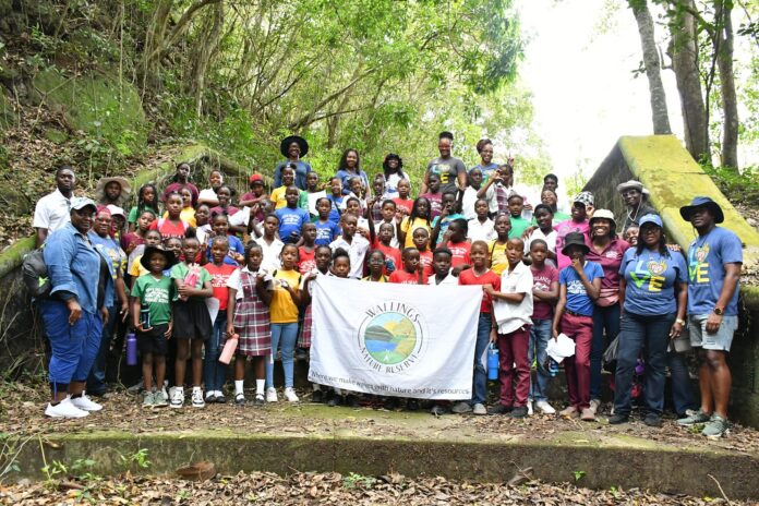 Earth-Day-Tour-particpants-including-students-teachers-and-Sandals-Foundation-volunteers-at-Wallings-Nature-Reserve-scaled.jpg